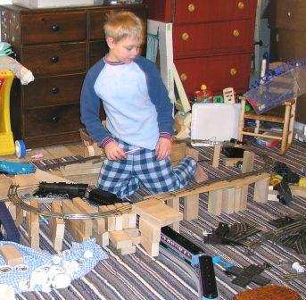 Jeffery works on a train layout