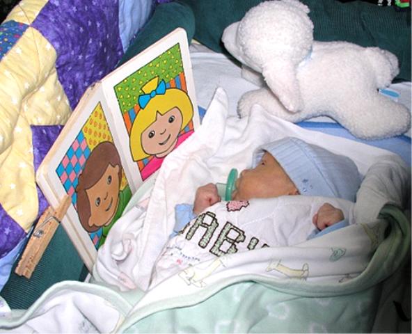 Thomas checks out a book