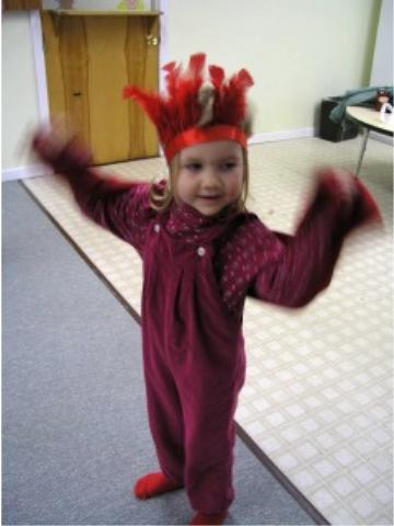 Bethan dressed as a cardinal for Kindermusik class
