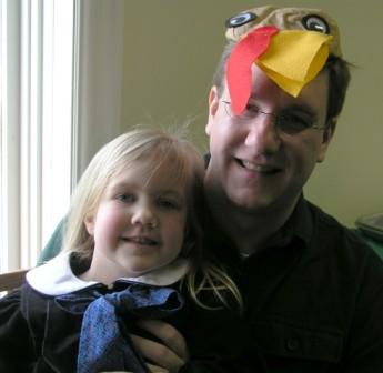 Daddy tries on Bethan's turkey hat