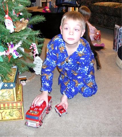 Jeffery with new PJs and Hess truck