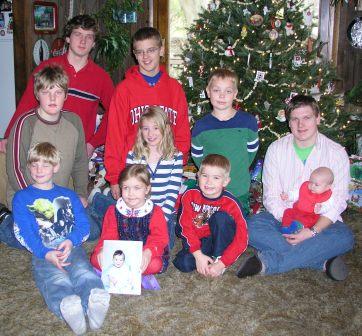 Eleven cousins smiling...