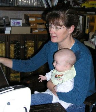 Thomas checks out the computer with Aunt Gail