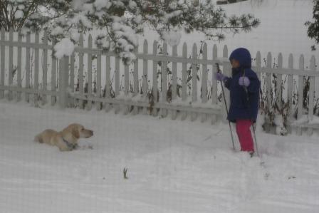 Jake and Bethan enjoy a ski in the back yard.