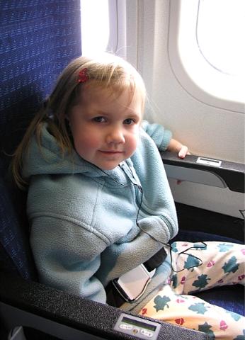 Waiting for her first plane flight that never was.