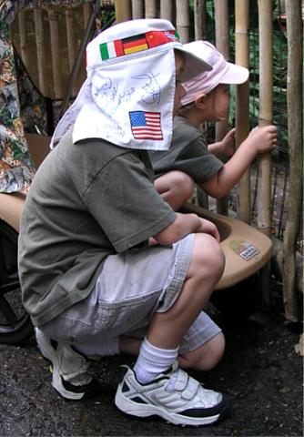 Jeffery wearing hat signed by Disney friends