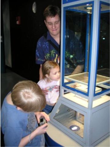 Touching an actual moon rock