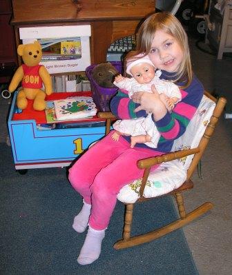 Bethan takes care of Mommy's old baby doll