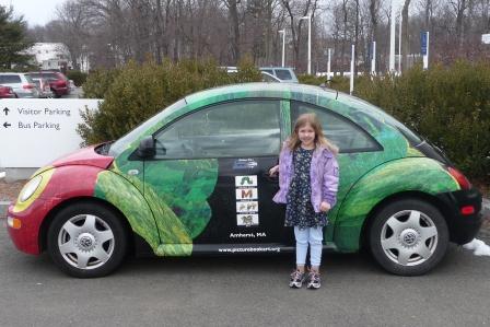 Bethan with the Eric Carle bug car