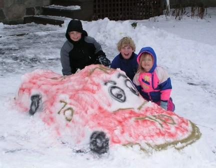 A sports car complete with SNOW tires!
