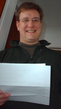 Daddy is reading his mail