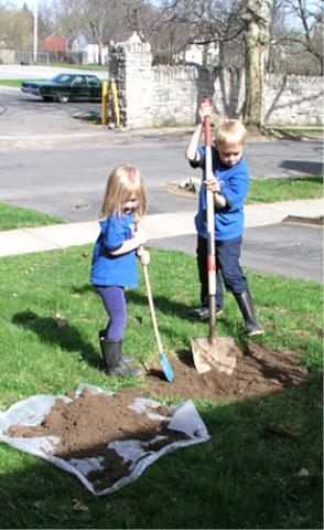 Digging a hole for the new Hydrangea bush