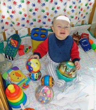 Thomas LOVES the playpen