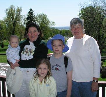 On the mansion porch overlooking the lake
