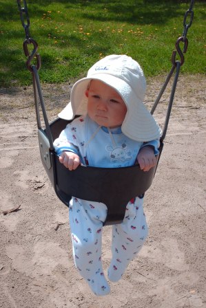 Thomas in the playground swing