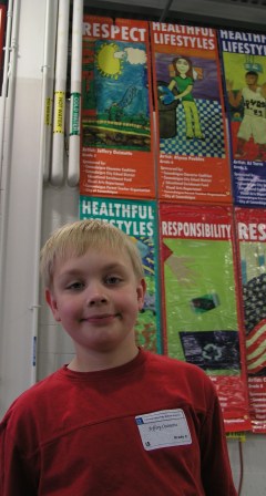 Jeffery after the unveiling below his banner