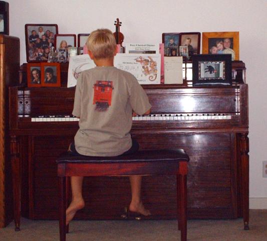 Jeffery practices piano