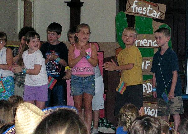 Jeffery on stage at Vacation Bible School