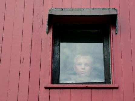 Jeffery looks out the caboose window at GCM