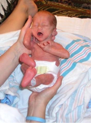 Thomas at 3 weeks: 4 pounds and 6 ounces