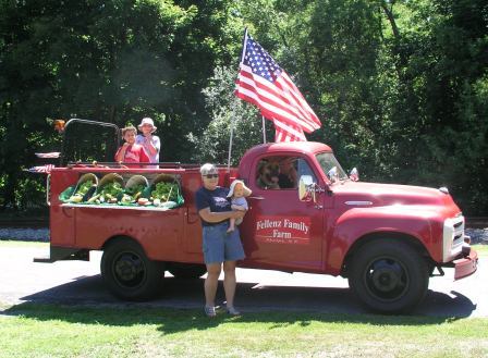 Thomas rode on Grandpa's firetruck in the Phelps Saurkraut Festival Parade