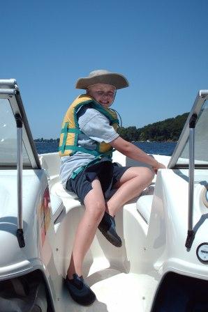 Jeffery enjoys a boat ride on Sodus Bay