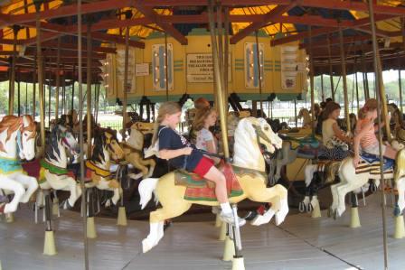 Riding the carousel on The Mall