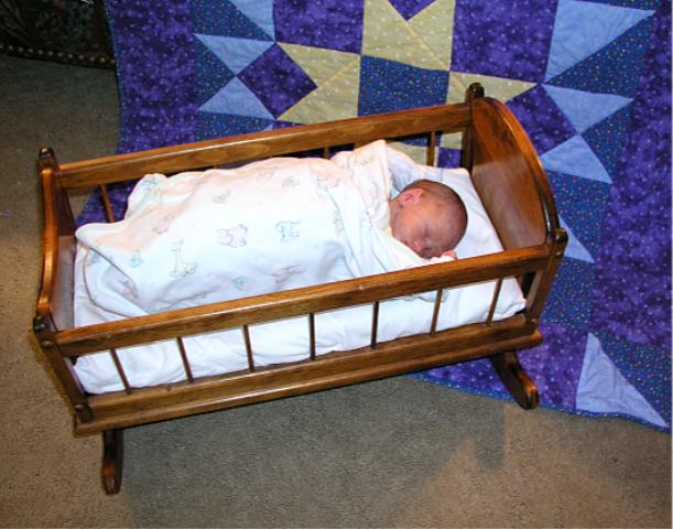 Thomas with his NICU "Linus Project Quilt"