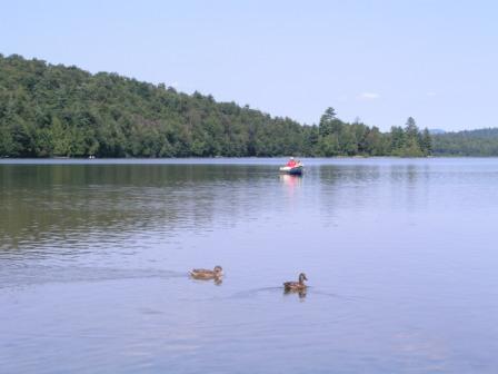 Bethan canoeing with Dad and fishing
