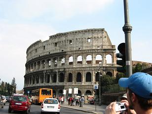 This is the Colosseum from one of the adjacent streets.&nbsp; Also you'll notice Kiley's head in the lower right hand corner. :-)