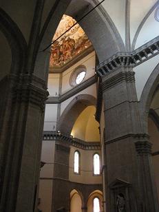 Looking through the front arch, you can see part of the dome and a side section of the church.