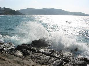 Wave crashing onto the rocks.&nbsp; For those of you wondering, they do have sand beaches, I just didn't put any pictures up of them.