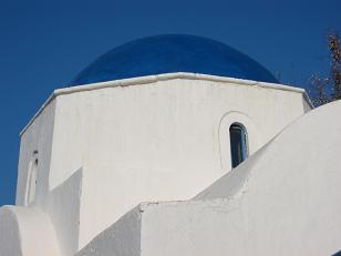 White washed buildings and blue roofs are the typical scene on Mykonos