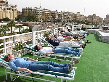 A nice nap in the sun on top of the cruise ship is always nice.&nbsp; This was shortly after our plane arrived in Aswan.