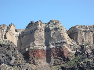 The cliffs on Santorini are the result of more than half the island sinking into the sea.&nbsp; Many years of layers can be seen.
