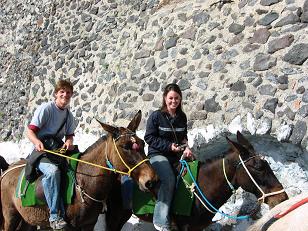Alan and Kristen on their donkeys as they ride to the top of the mountain.