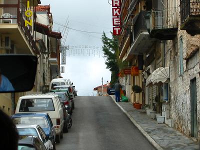 This is a small town street.&nbsp; Normally cars are parked on both sides of the road.&nbsp; Yet we still manage to get a big tour bus through.&nbsp; Oh, and Greek drivers pass anywhere.&nbsp; Even with oncoming traffic on a 2 lane road.&nbsp; Everyone just squeezes by.&nbsp; Makes life interesting.