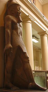 Statue on left side of entry way.&nbsp; The left foot is forward because it is the side of his heart, meaning he was alive.