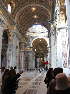 This is a view down the middle of Saint Peter's toward the bronze canopy covering what are said to be the bones of Peter.