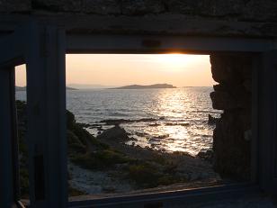 View of sunset through the same window as above.