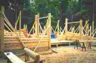 log home construction, walls going up