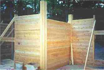 log home construction, walls going up