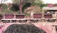 Bemo 4 wheel skips were modified to form these bogie coal hopper cars.