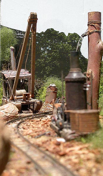 During a break in the loading process, Tom Pogson walked down the track, and caught this "longshot" image of the Camp 4 W.I.W. yarder and A frame loader