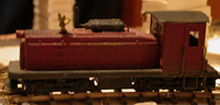 Dynamite Canyon's workhorse loco. This little hauler was bashed from a Life Like N scale SW1200. It grew a HO scale ex Joe Works Plymouth cab and grille, and got some sporty extra airtanks topside.