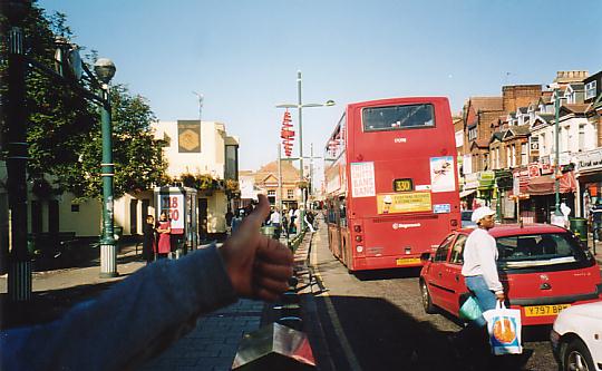 Red bus on Green St