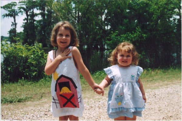 At Lake Martin with her sister in 2002 (Age 5)