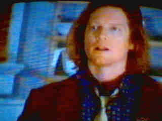 Dimitri reacts to Grace's attempted seduction.