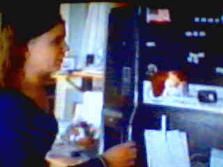 Grace opens Dimitri's fridge very familiarly.