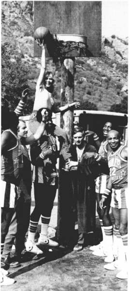 Loretta, Alan Alda and Mike Farrell with the Globetrotters at the set of M*A*S*H